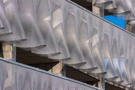 stretched metal fabric facade|fabric based exterior design.